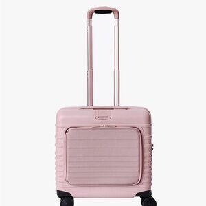 Pink Hard Shell Suitcase with Stink Bag